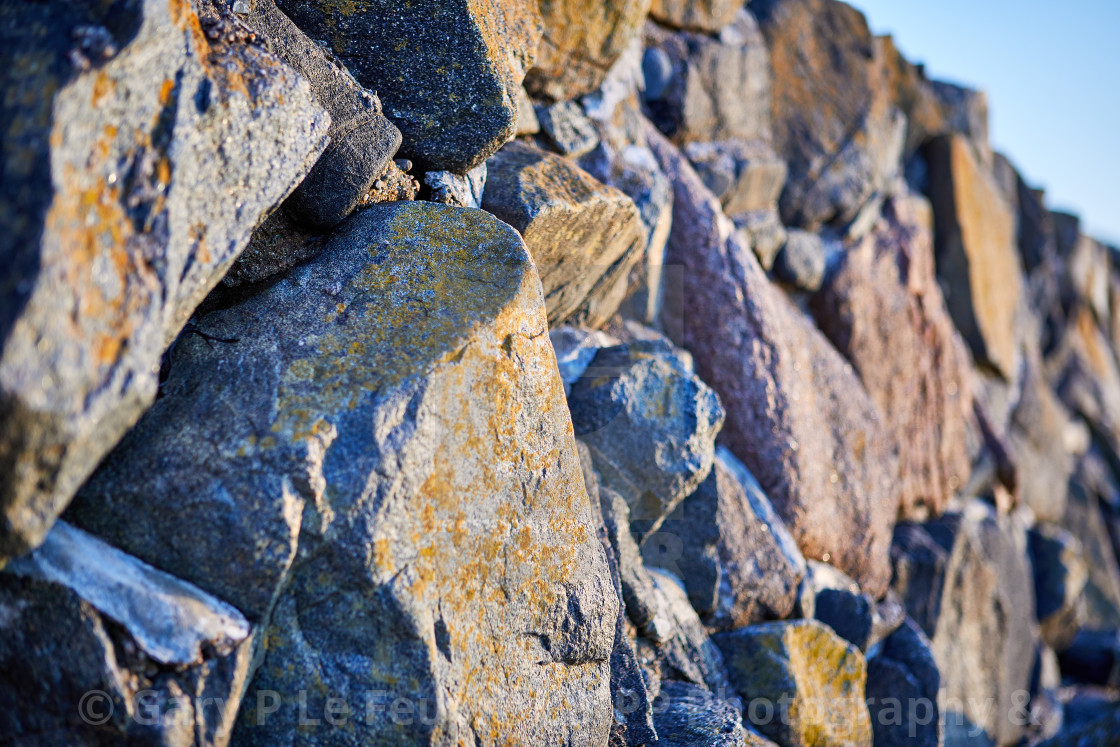 "Granite coastal stone wall" stock image