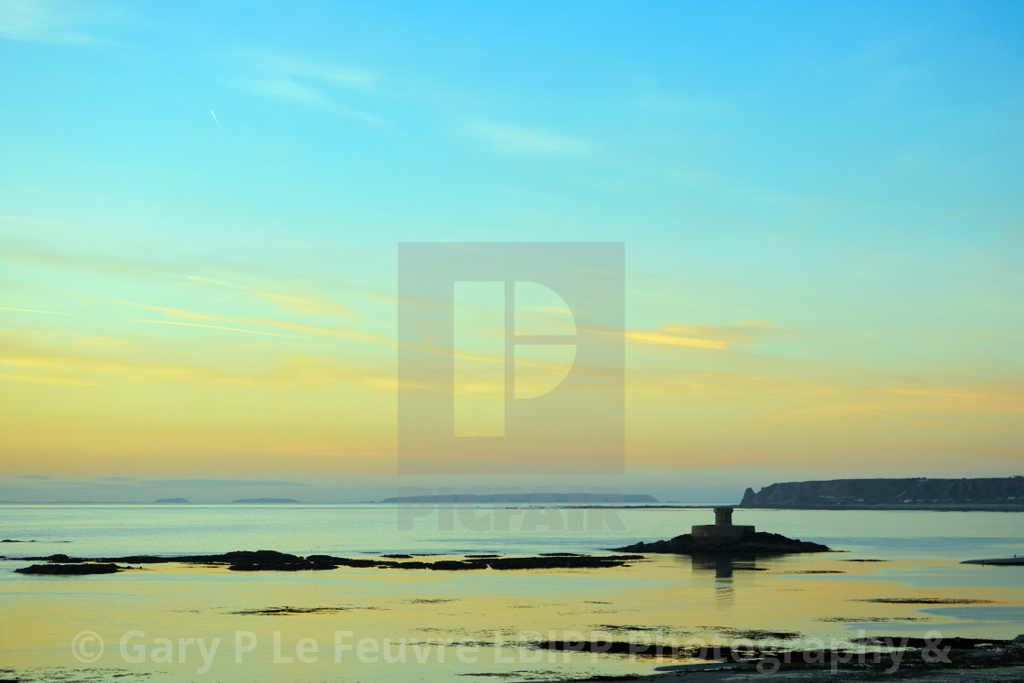 "St Ouens Bay with Rocco Tower and Sark in the background. Jersey CI" stock image