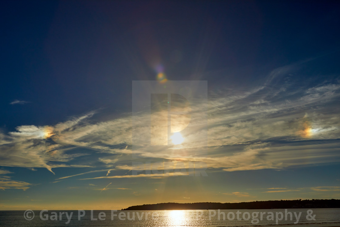 "Image of St Aubins Bay with shunshine and Noirmont point in the background. Jersey Channel Islands" stock image