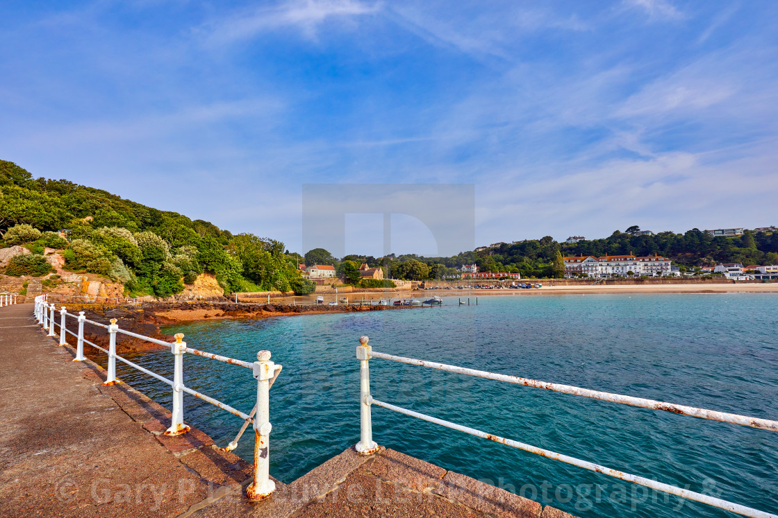 "Image of St Brelades Bay Pier at half tide" stock image