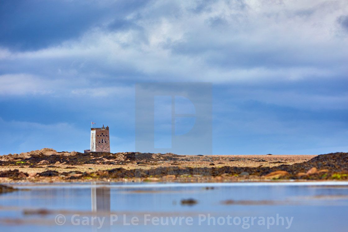 "Seymour Tower with cloudy sky and reflection in pool" by Gary P Le Feuvre, Photography - £35.00 "Seymour Tower with cloudy sky and reflection in pool" stock image