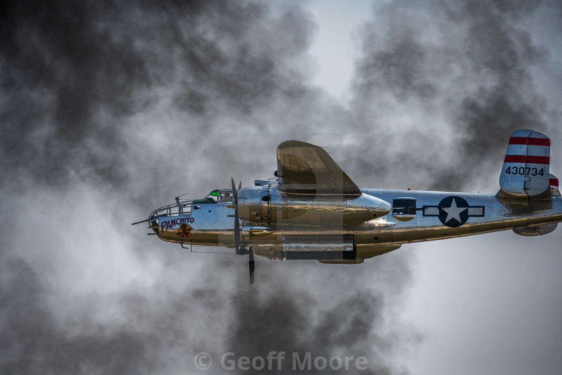 "B-25 Flying Through Smoke" stock image