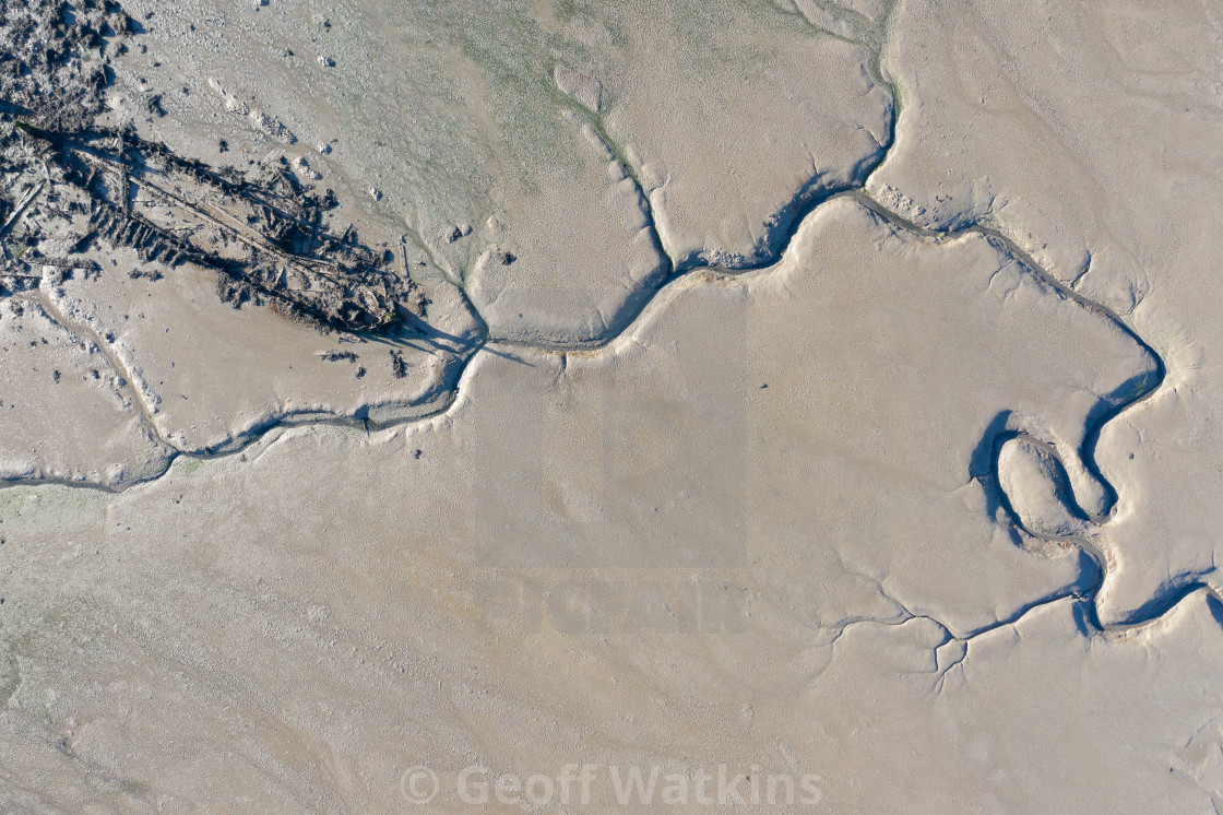 "Shipwreck in mudflats" stock image