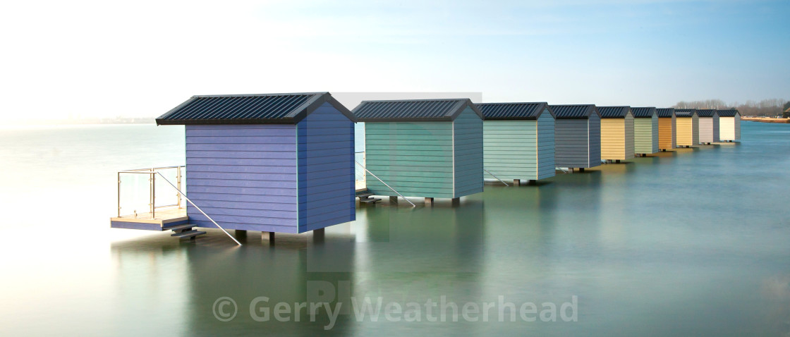 "Osea Beach Huts #2" by Gerry Weatherhead - $38.47 "Osea Beach Huts #2" stock image