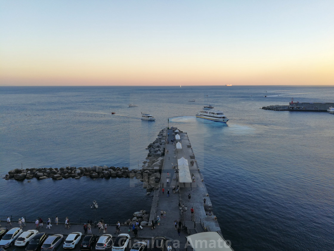 "Amalfi - Pontile del porto al tramonto" stock image