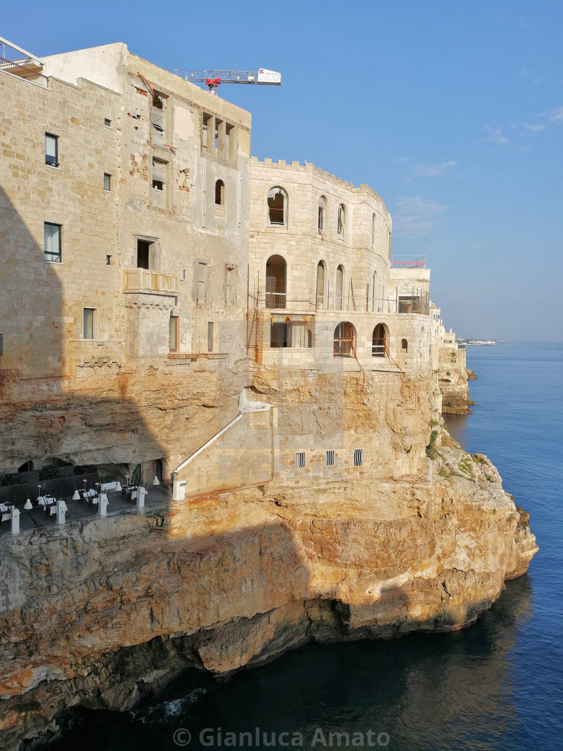 "Polignano a Mare - Scorcio di Grotta Palazzese all'alba" stock image