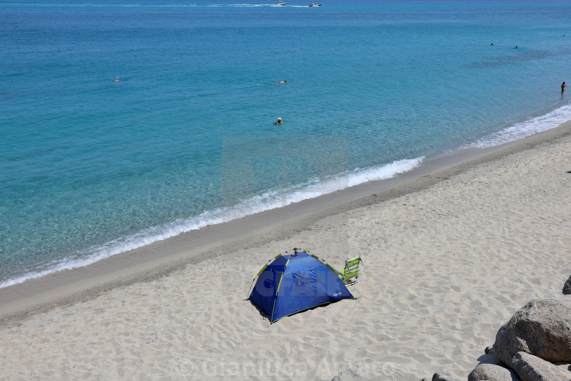 "Tropea - Tenda sulla Spiaggia della Rotonda" stock image