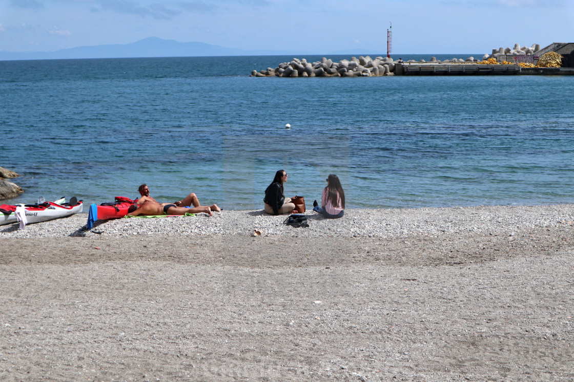 "Cetara - Turiste sulla Spiaggia della Marina" by Gianluca Amato - $3.76 "Cetara - Turiste sulla Spiaggia della Marina" stock image