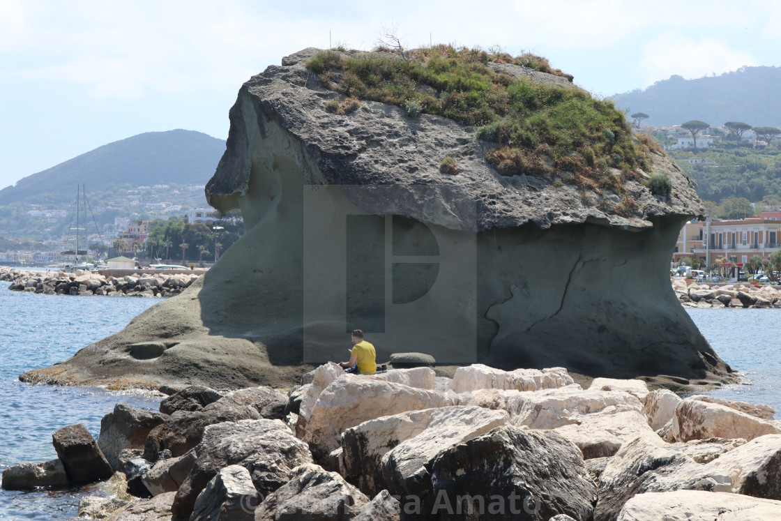 "Lacco Ameno - Turista solitario allo scoglio del fungo" stock image