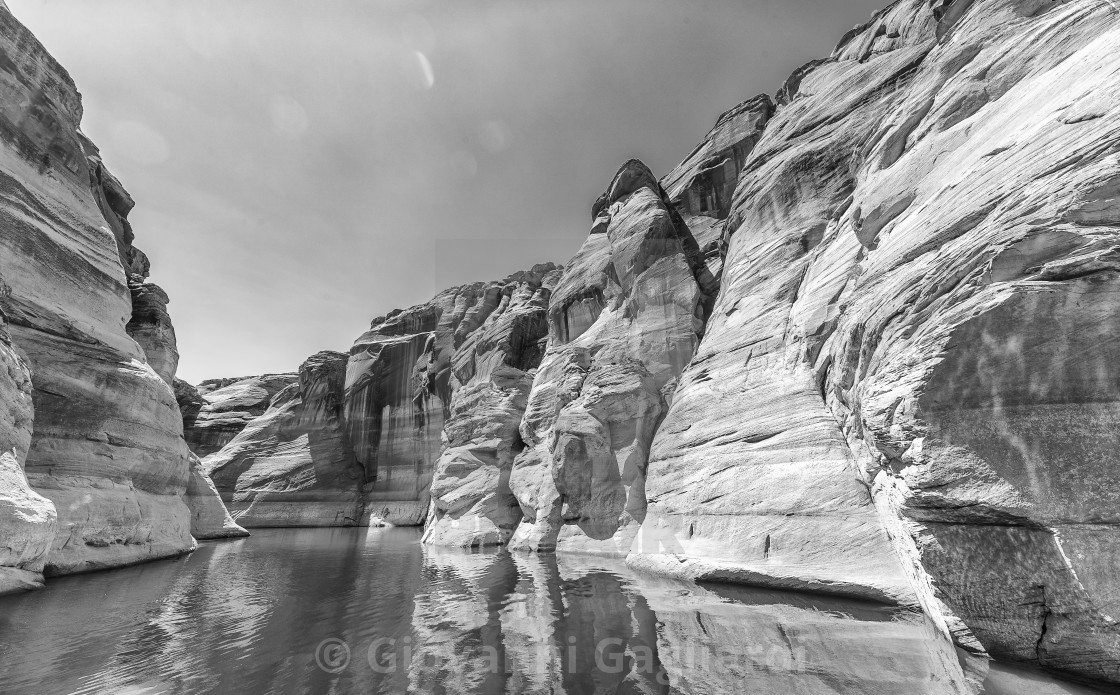 "Lake Powell, Arizona. Narrow cliff-lined canyon from a boat in Glen Canyon..." by Giovanni Gagliardi - $7.68 "Lake Powell, Arizona. Narrow cliff-lined canyon from a boat in Glen Canyon..." stock image