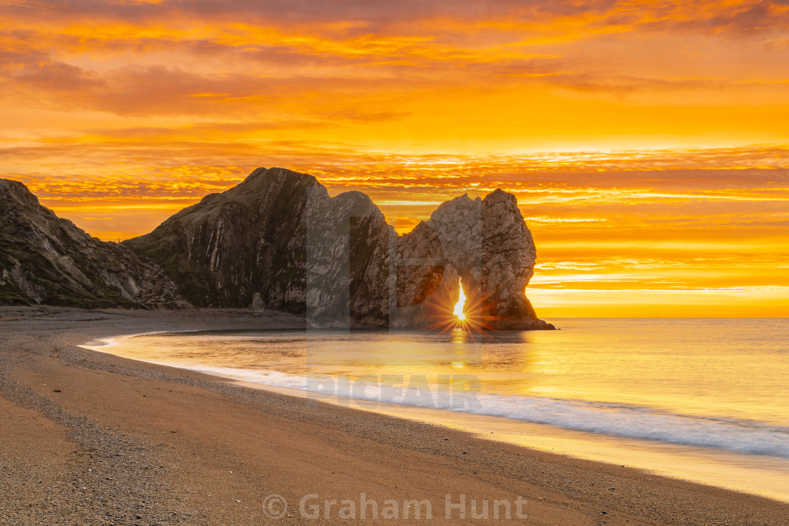 "UK Weather: Durdle Door Sunrise, Dorset, UK." stock image