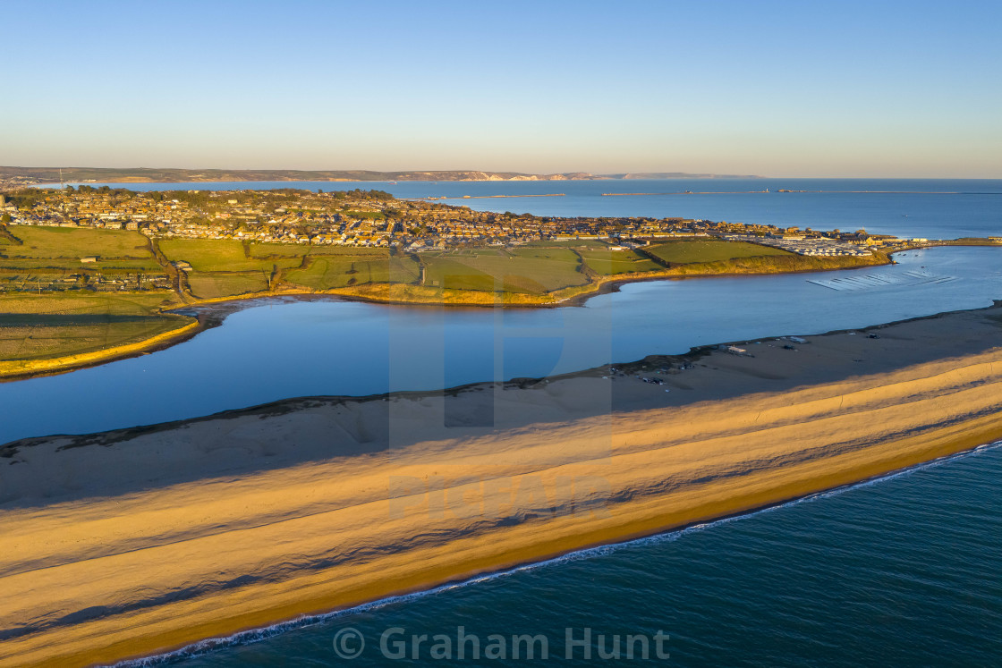 "Cold and Sunny at Chesil Beach at Weymouth in Dorset, UK." stock image