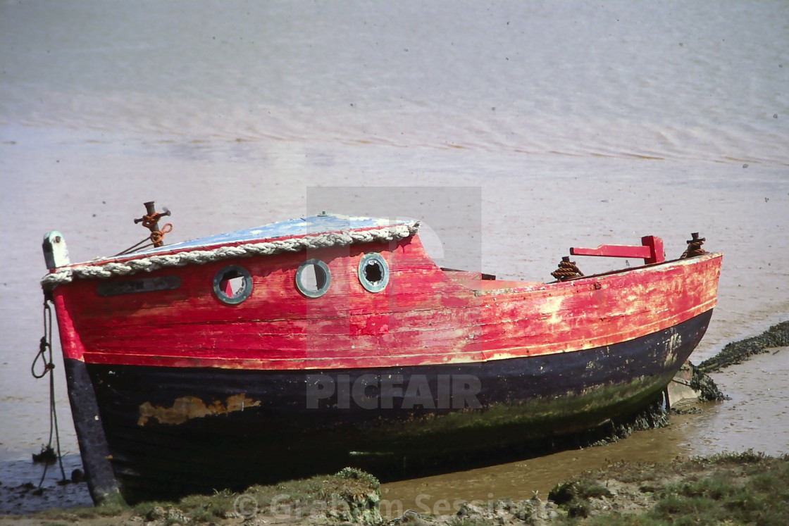 "Ancient Red Boat" stock image