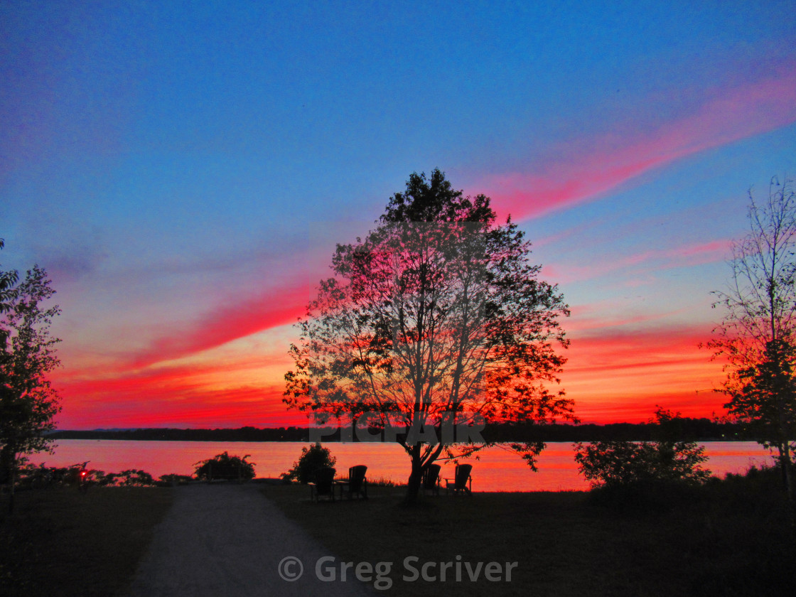 "Red - Orange Sunset glow reflection" stock image