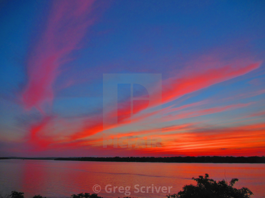 "Red - Orange Sunset glow reflection" stock image