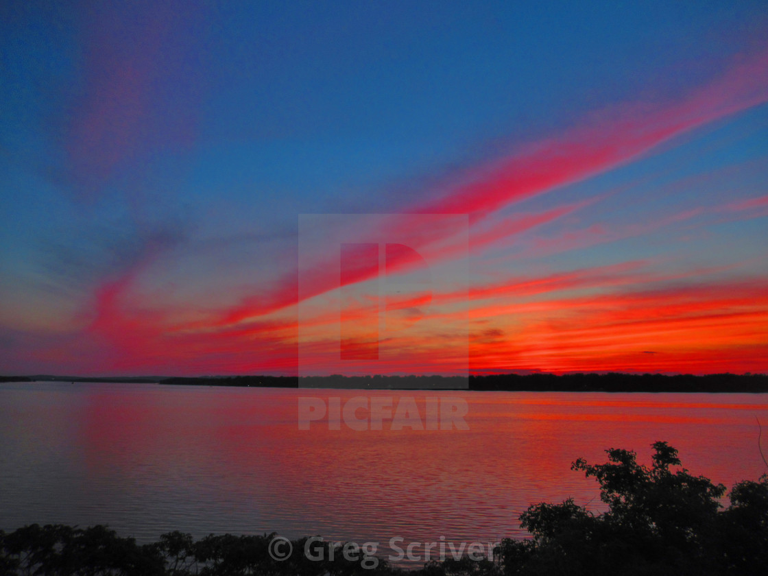 "Red - Orange Sunset glow reflection" stock image