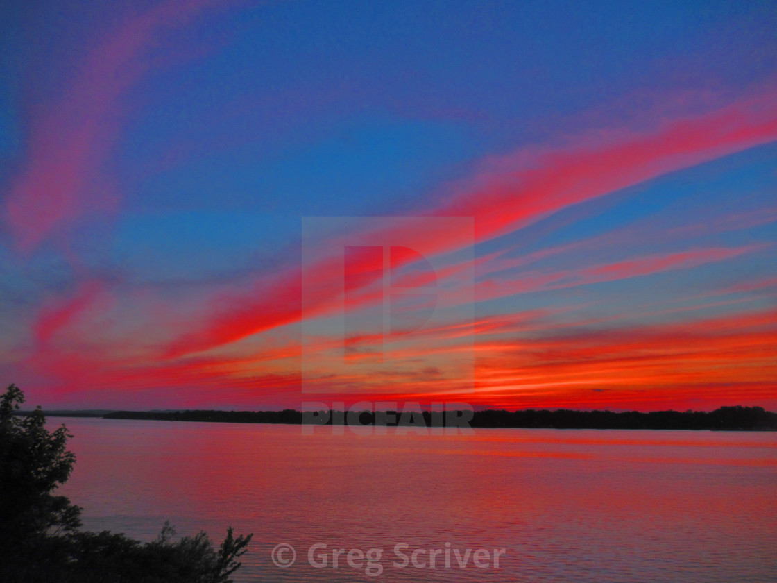 "Red - Orange Sunset glow reflection" stock image