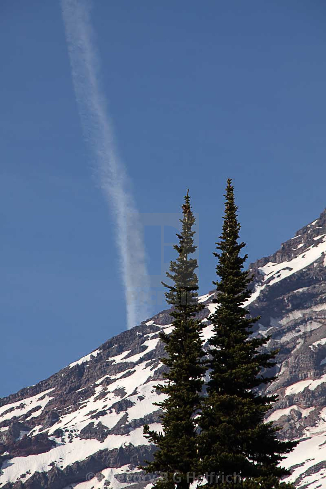 "Mt. Rainier Jet Stream Cloud. All rights reserved" stock image