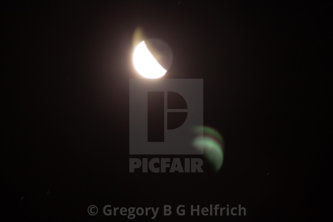 "Capture of a near Half Moon" stock image