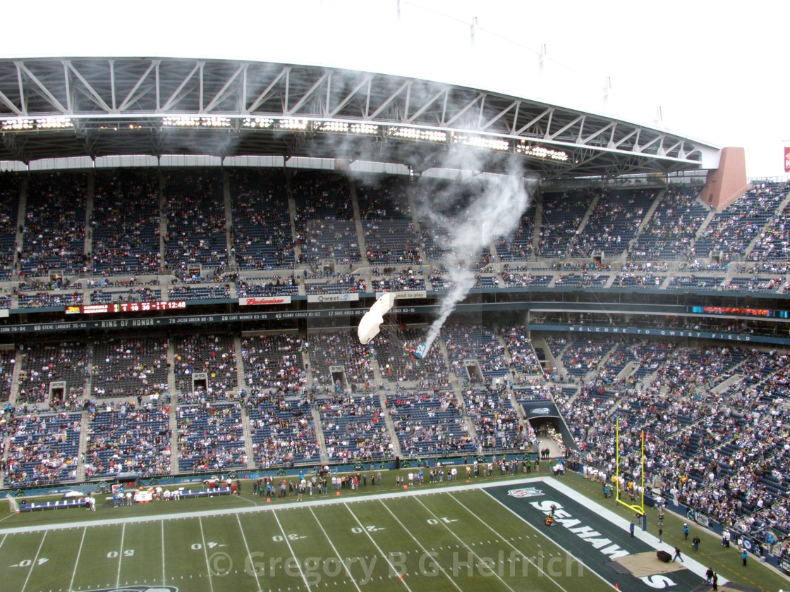 "2 Parachuters Smoking into Stadium" stock image