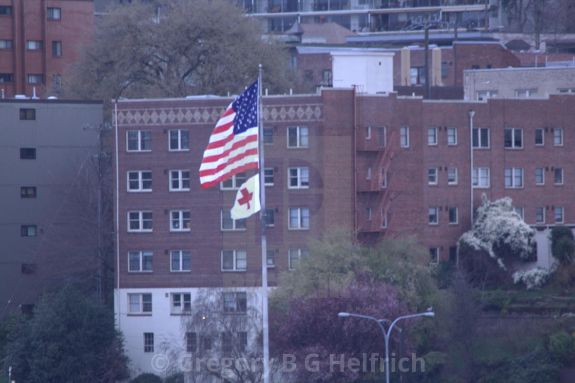 "Apartment Building Highrise With Red Cross Flag" stock image