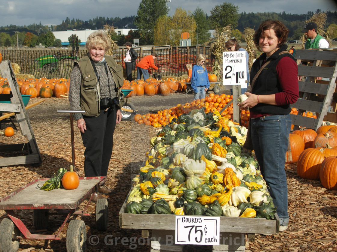 "Two Gals with a Smile Shopping for Gourds" stock image