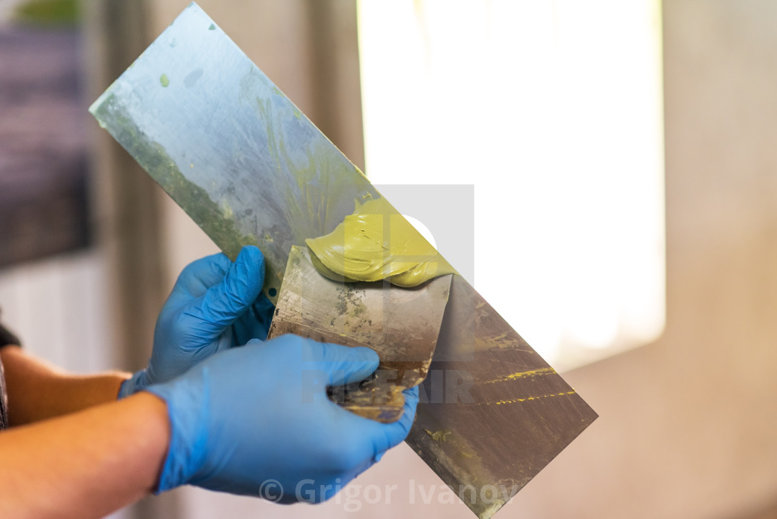 "Car paint repair Working on putty." stock image