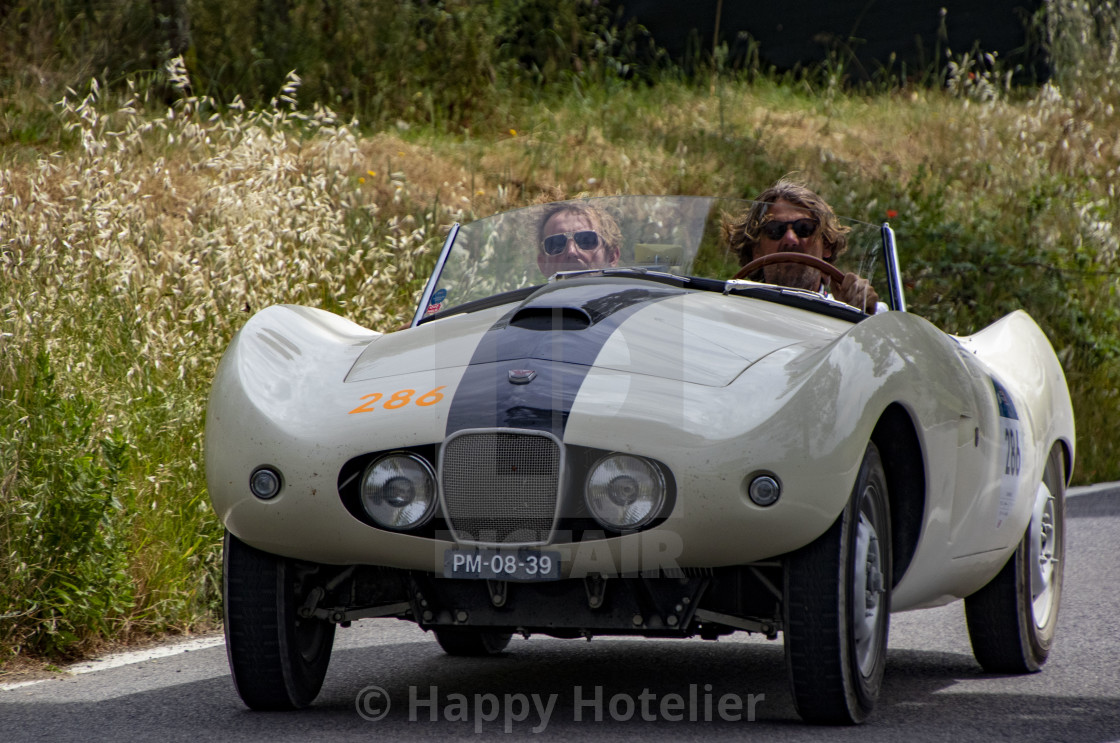 "Pins Bernhard van Oranje in the 2021 Mille Miglia" by Happy Hotelier - $31.41 "Pins Bernhard van Oranje in the 2021 Mille Miglia" stock image