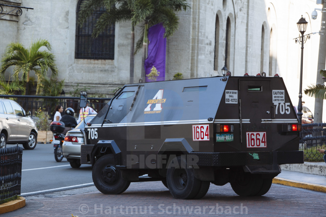 "Gepanzerter Geldtransporter in Manila" by Hartmut Schwarzbach - $61.04 "Gepanzerter Geldtransporter in Manila" stock image