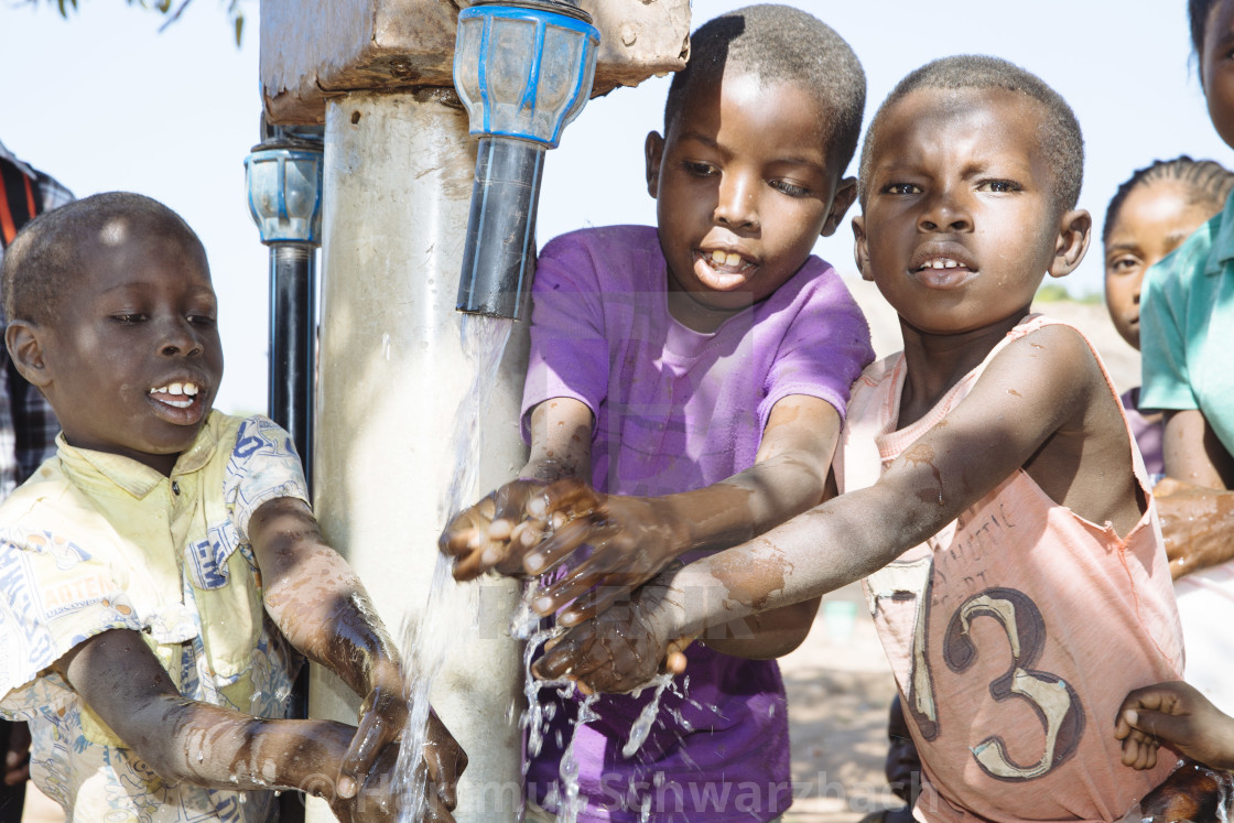 "water point for villagers" stock image