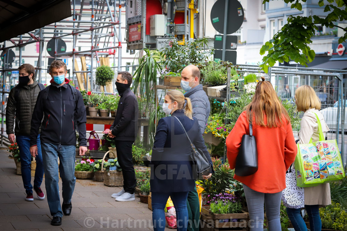 "Shopping with face masks during the Corona Pandemic and Crisis" stock image