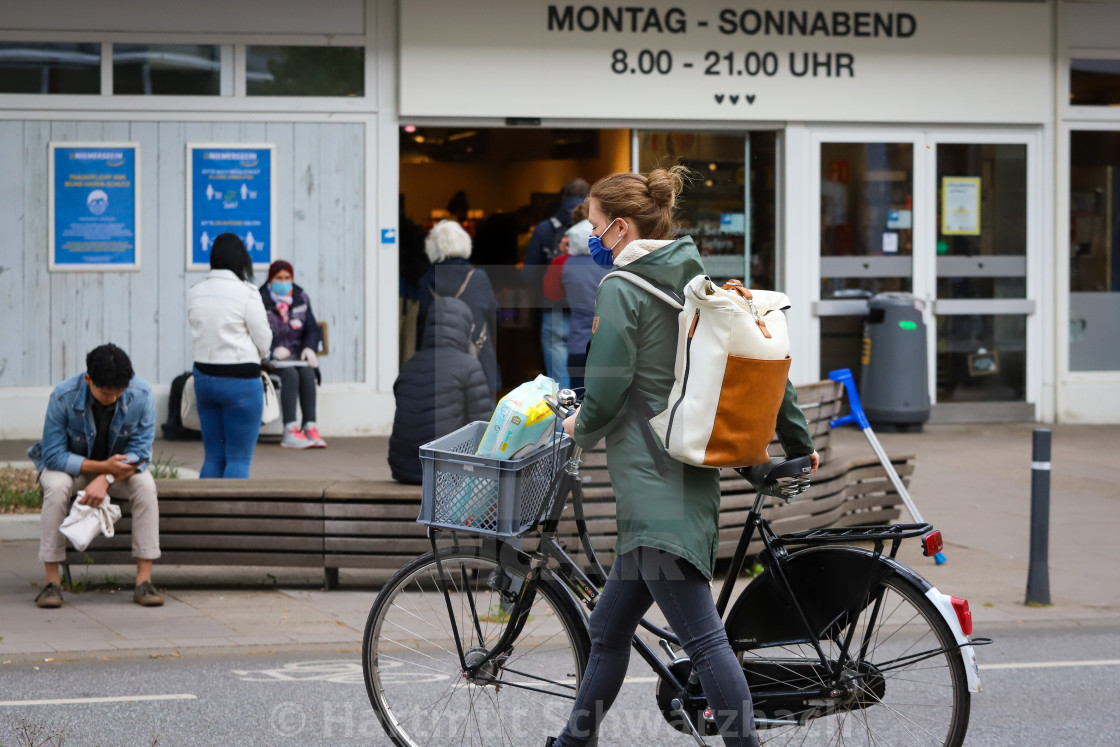 "Shopping with face masks during the Corona Pandemic and Crisis" stock image