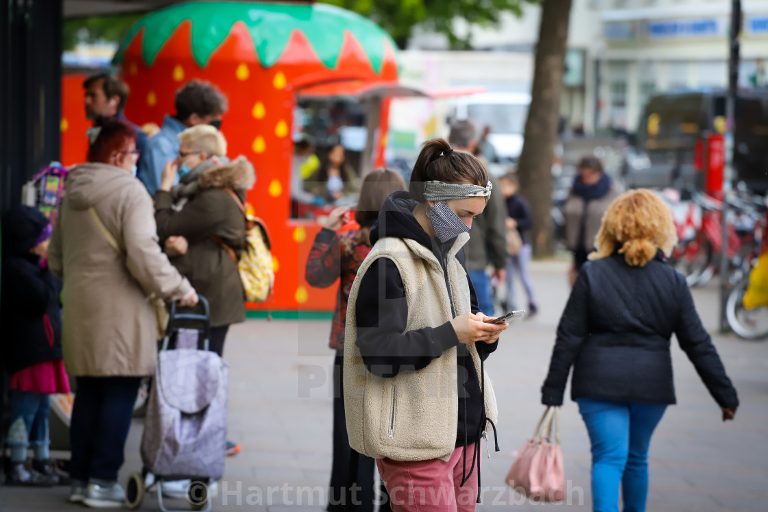 "Shopping with face masks during the Corona Pandemic and Crisis" stock image