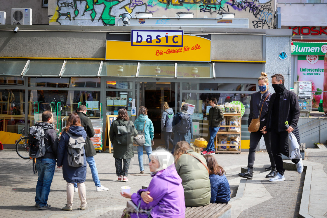 "Shopping with face masks during the Corona Pandemic and Crisis" stock image