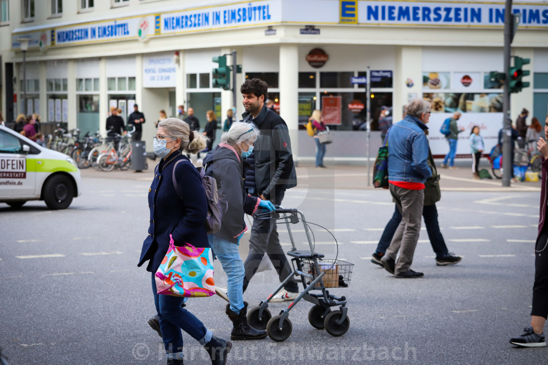 "Shopping with face masks during the Corona Pandemic and Crisis" stock image