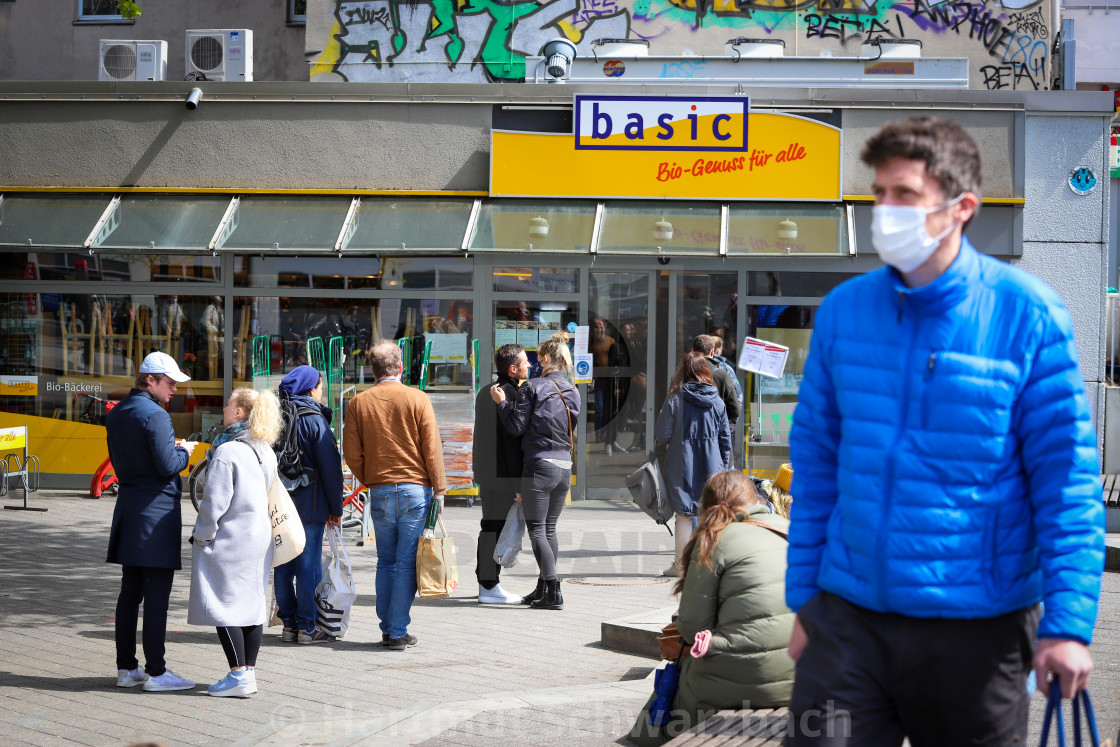 "Shopping with face masks during the Corona Pandemic and Crisis" stock image