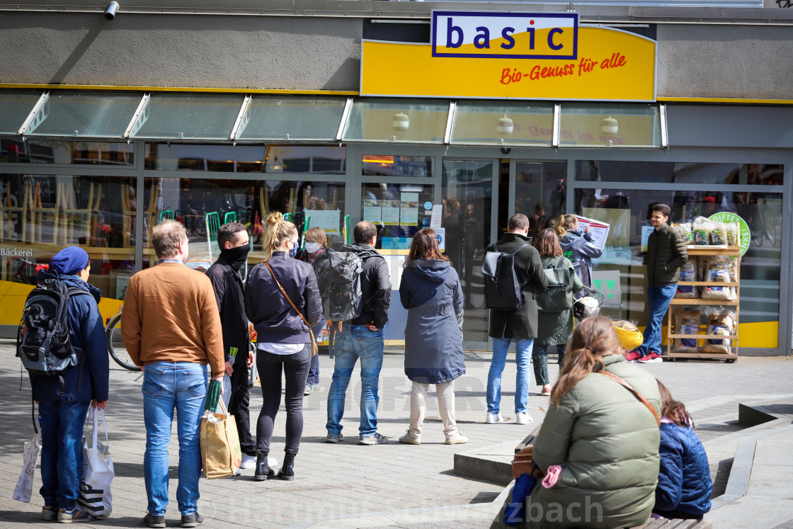 "Shopping with face masks during the Corona Pandemic and Crisis" stock image