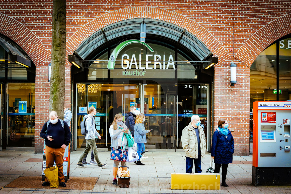 "Shopping with face masks during the Corona Pandemic and Crisis" stock image