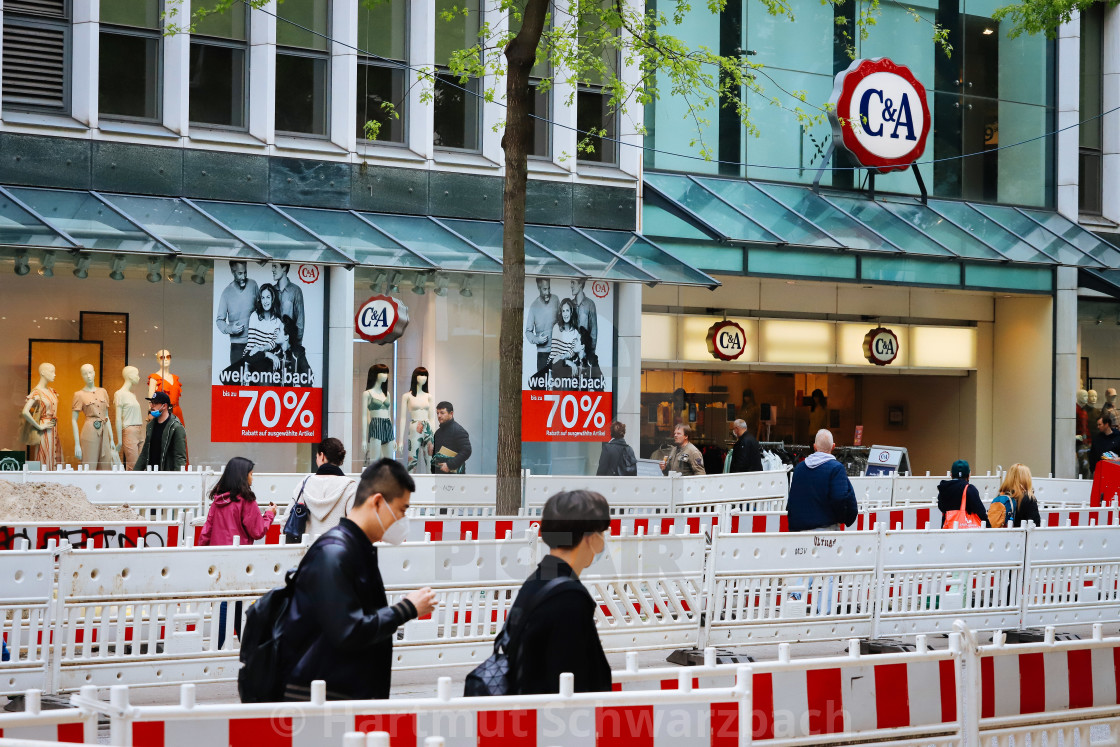 "Shopping with face masks during the Corona Pandemic and Crisis" stock image