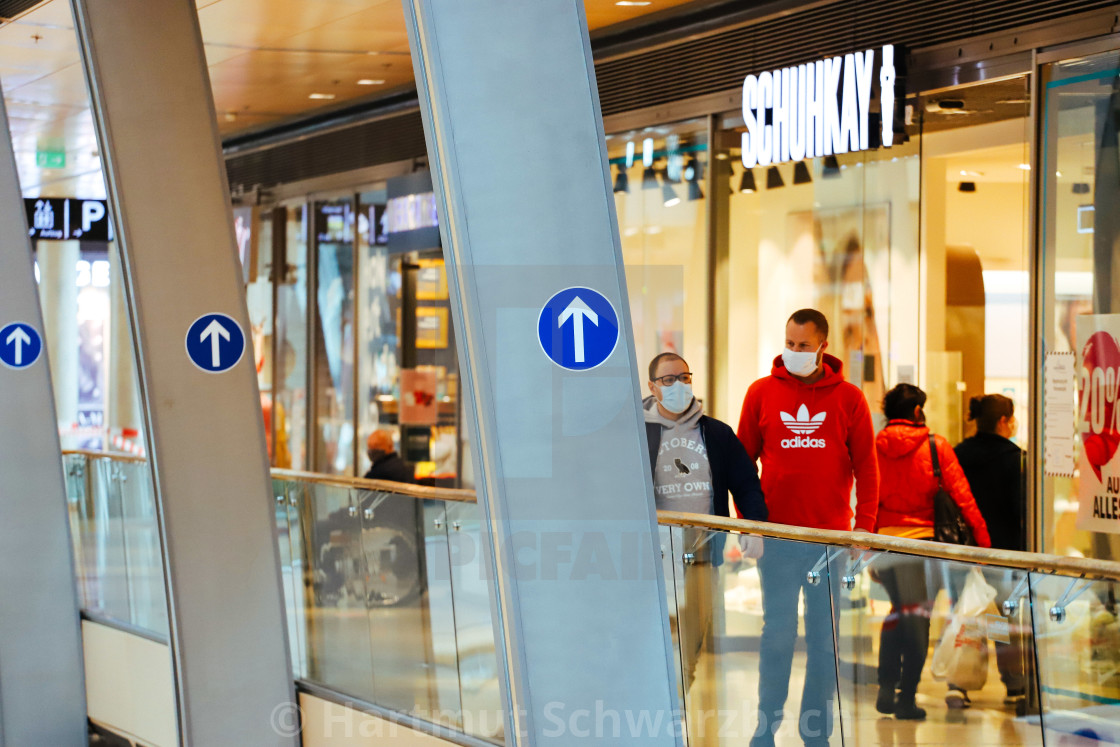 "Shopping with face masks during the Corona Pandemic and Crisis" stock image