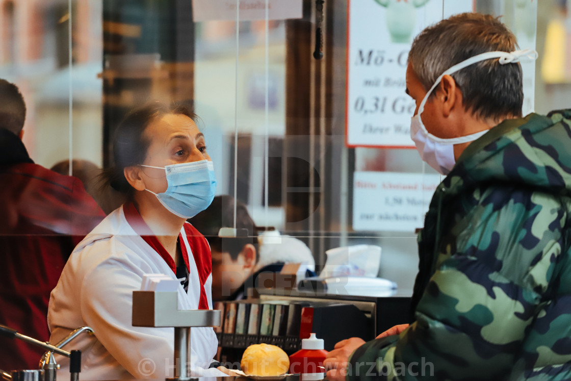 "Shopping with face masks during the Corona Pandemic and Crisis" stock image