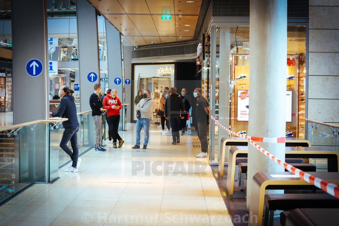 "Shopping with face masks during the Corona Pandemic and Crisis" stock image