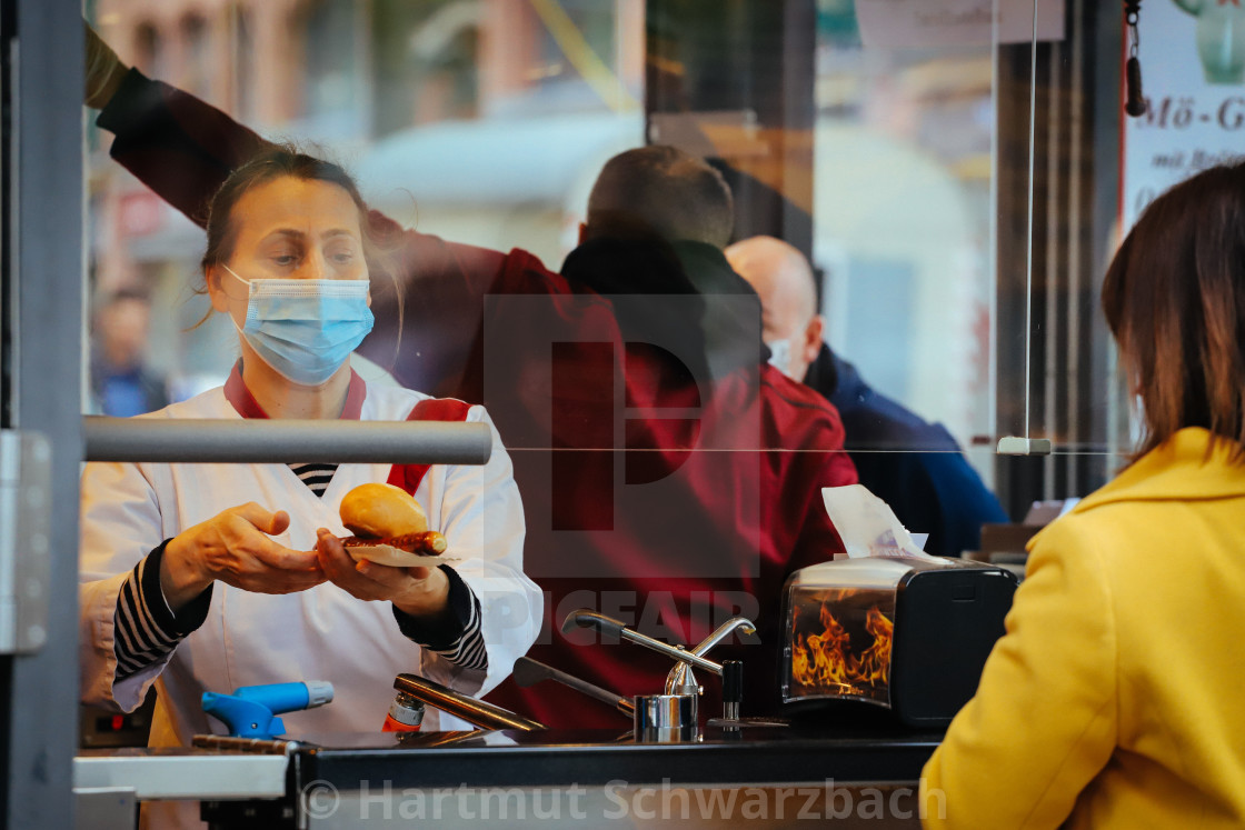 "Shopping with face masks during the Corona Pandemic and Crisis" stock image