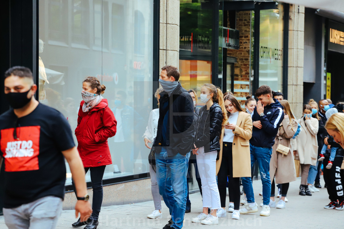 "Shopping with face masks during the Corona Pandemic and Crisis" stock image