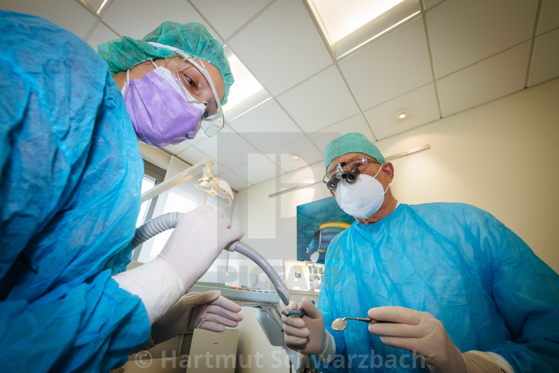 "Dentist with special protection during the Corona Pandemic" stock image