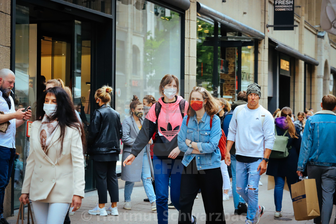 "Shopping with face masks during the Corona Pandemic and Crisis" stock image