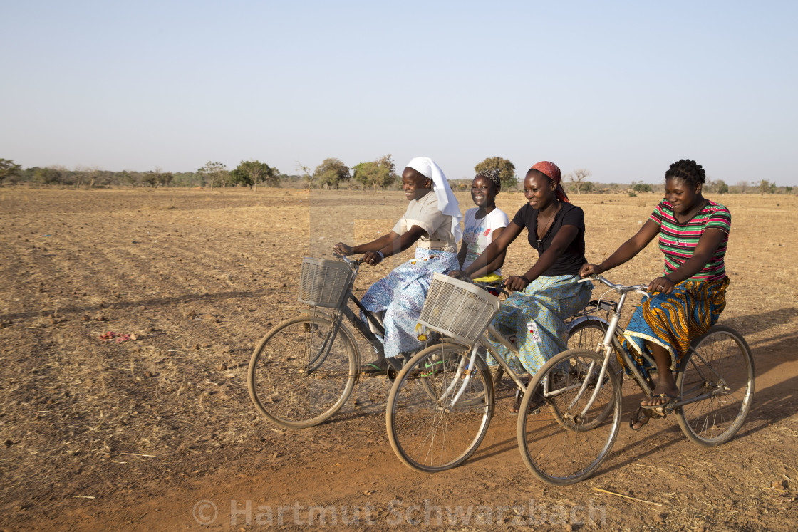 "Catholic Sisters on bike tour in Burkina Faso" stock image