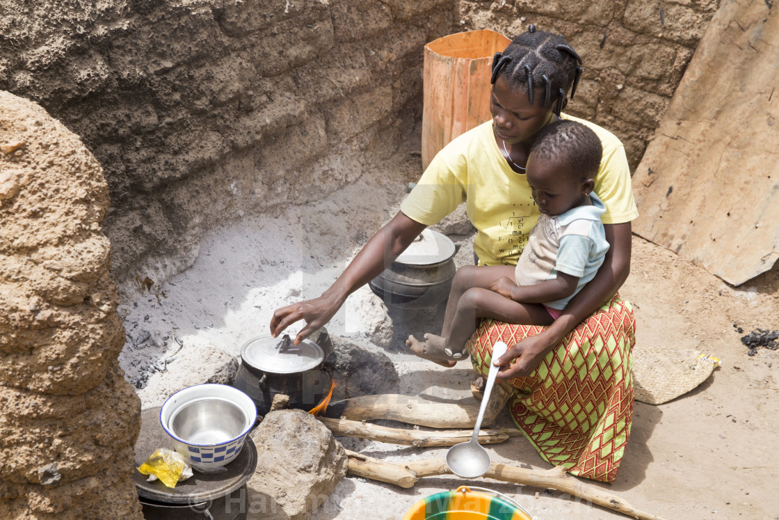 "Mother cooking in Burkina Faso" stock image