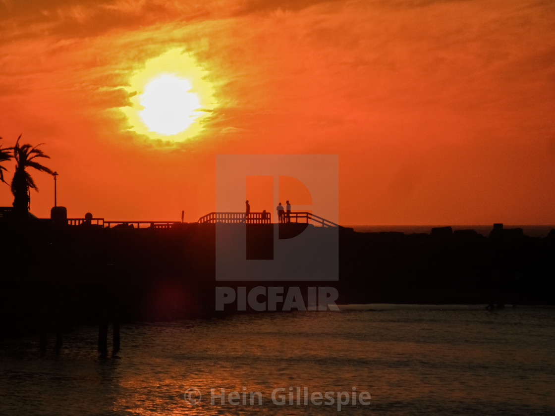 "Silhouettes on a Swakopmund Peer" by Hein Gillespie - £1.24 "Silhouettes on a Swakopmund Peer" stock image