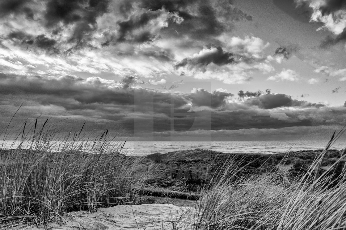 "Dunes, beach, dunes, sky with clouds in the Netherlands" stock image